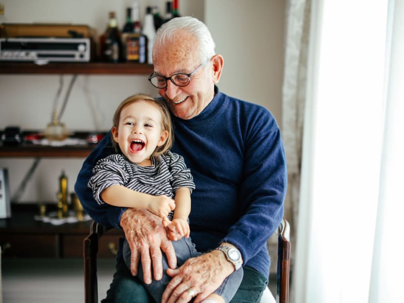 A resident with his grandson at Wyndemere Memory Care in Green Bay, Wisconsin. 