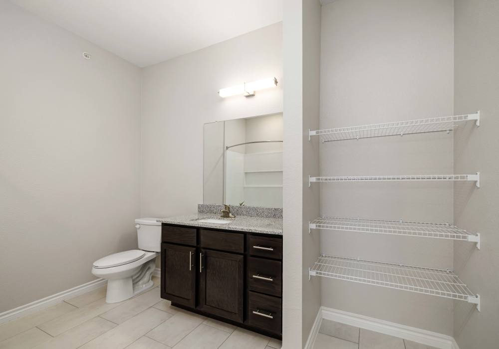 Bathroom with storage units at Walnut Springs in Seguin, Texas