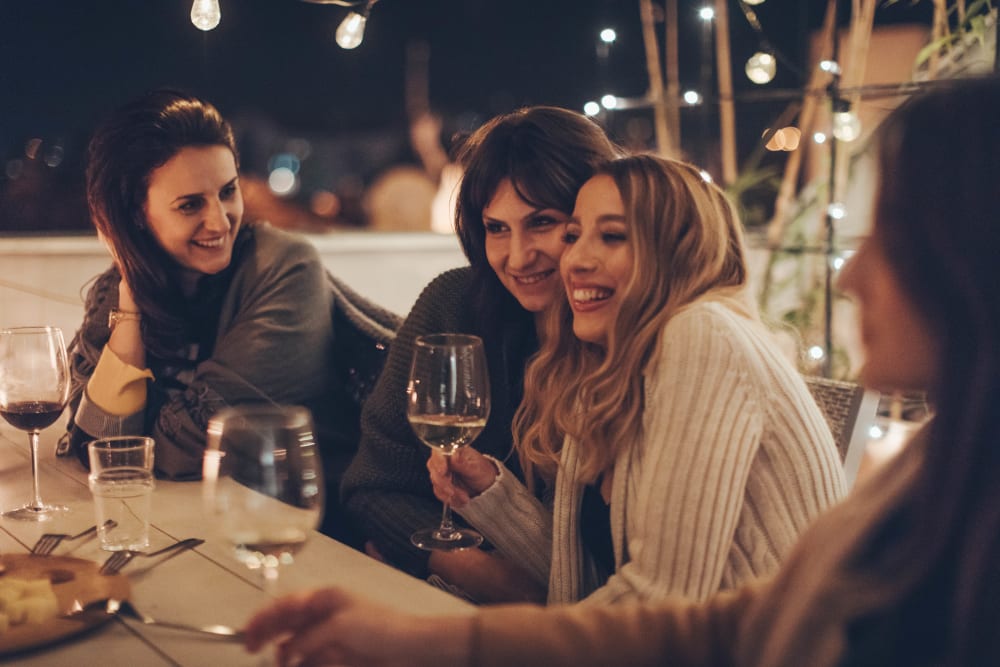 Resident lady friends enjoying the evening together near Canyon View in Las Vegas, Nevada