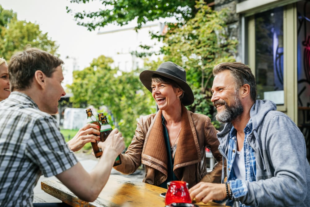 Residents enjoying a beverage at a local brewery near Brooklyn Yard in Portland, Oregon