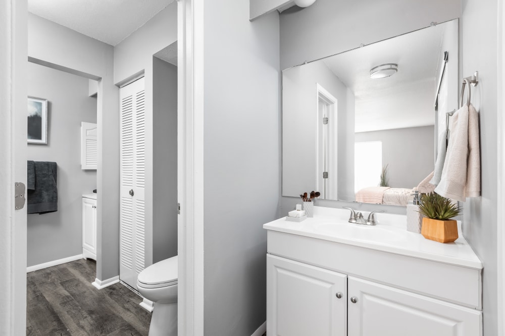 Bathroom with vanity in separate room