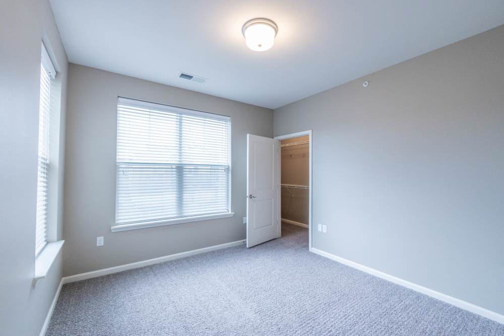 Spacious bedroom with large window atVillas On Fir in Granger, Indiana