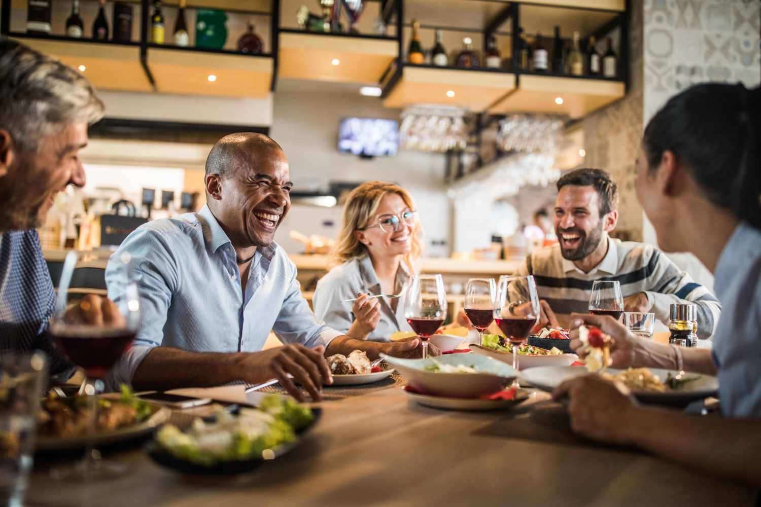 Resident family eating at a restaurant near Trax at Dupont Station in Dupont, Washington