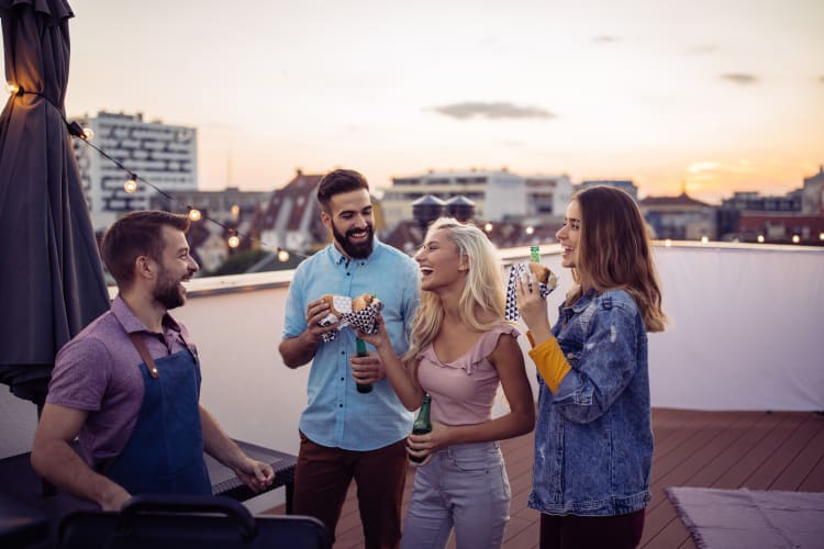 Residents hanging out on the rooftop at The Kahn in Detroit, Michigan