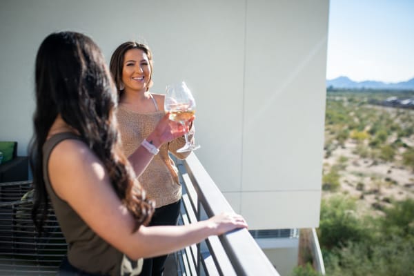 Residents enjoying their private balcony at BB Living at Val Vista in Gilbert, Arizona
