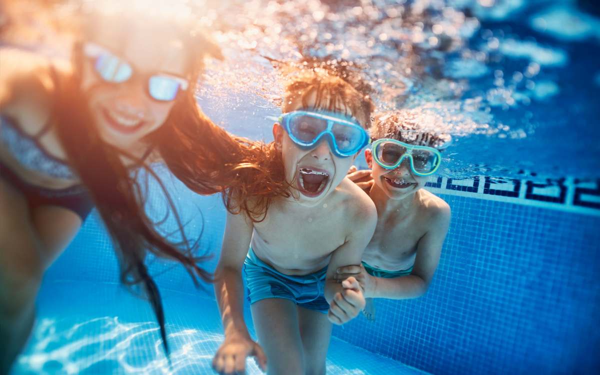 Residents cooling off in the outdoor swimming pool at Hunt Club Apartments in Cockeysville, Maryland