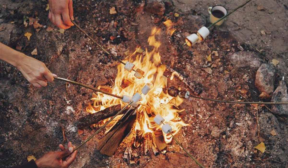 Residents toasting marshmallows near The Block at Petoskey in Petoskey, Michigan