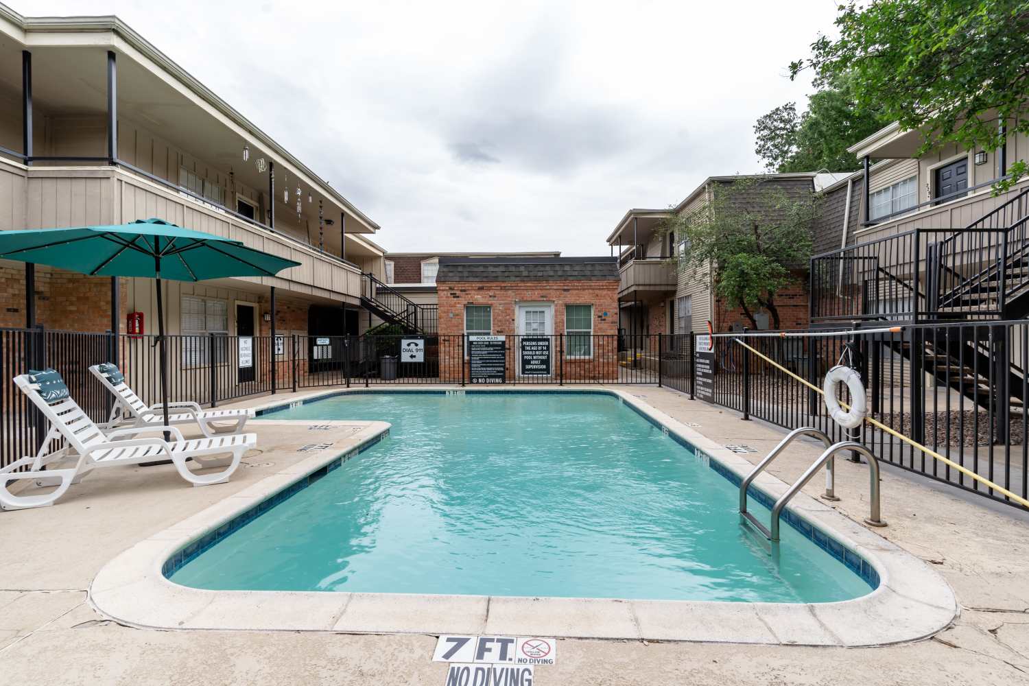 Serene swimming pool at Arbor Park Apartments in Hurst, Texas