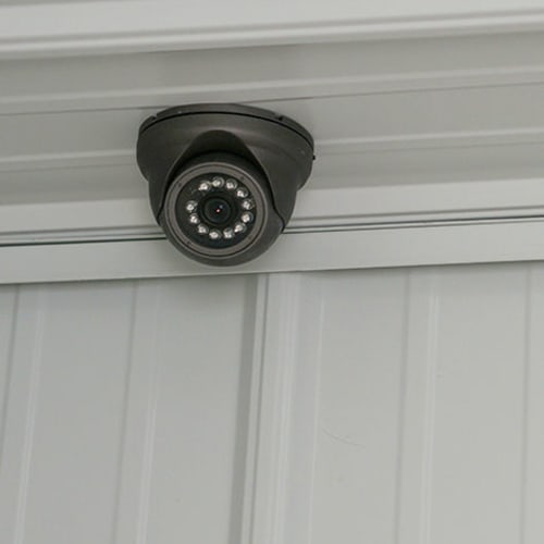 Security camera mounted on the ceiling at Red Dot Storage in Woodstock, Illinois