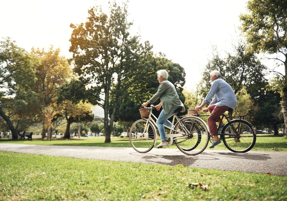 Couple riding their bikes around Macon, Georgia near Hunter's Run
