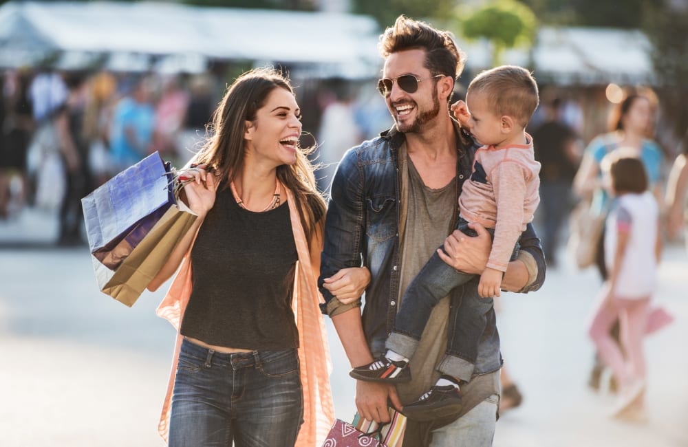 Resident family shopping at a near by store at Kannan Station Apartment Homes in Kannapolis, North Carolina