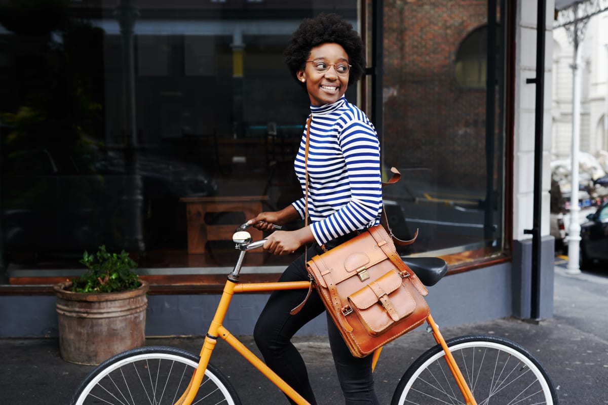 Employee biking to job at Bellrock Real Estate Partners in Fort Worth, Texas