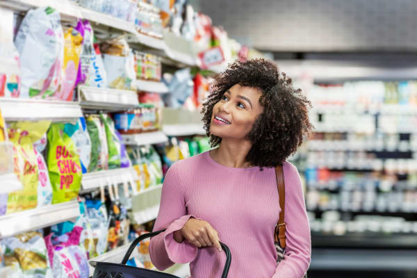 Woman shopping at convenient store at Mosaic Dallas