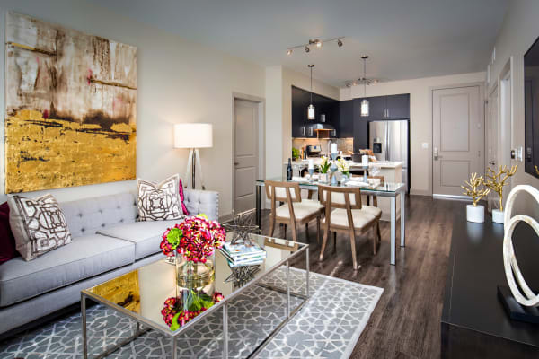 Beautiful open-concept layout with hardwood floors in a model home at The Core Scottsdale in Scottsdale, Arizona