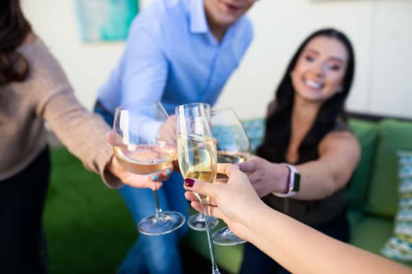 Resident raising a toast to the good life at Arista at Ocotillo in Chandler, Arizona