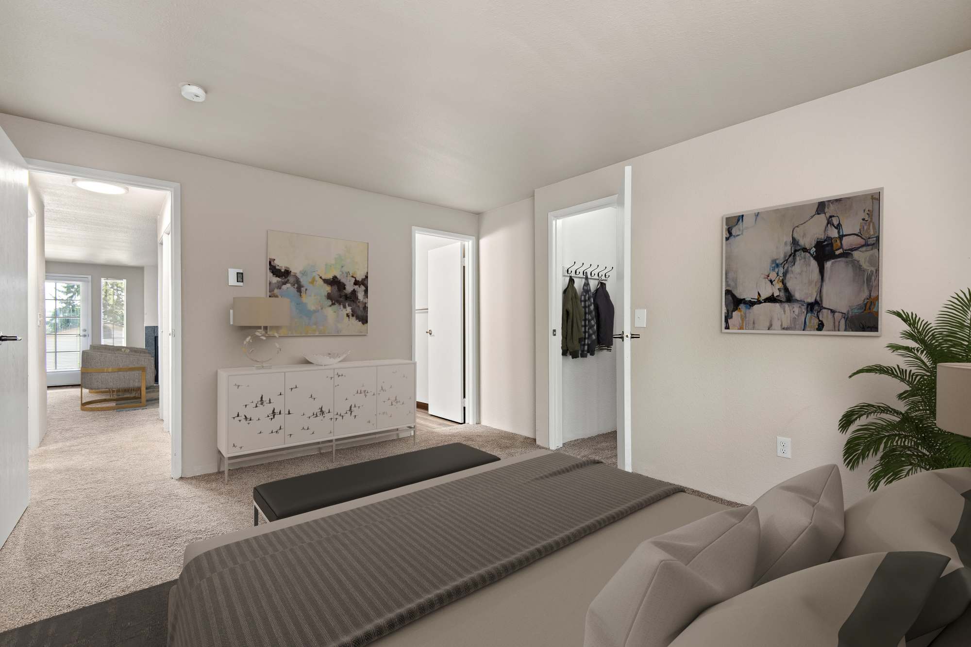 Bedroom with a closet area at Wellington Apartments in Silverdale, Washington