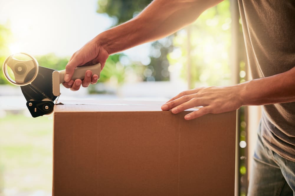 A customer packing a box to store at My Self Storage Space in Spring Valley, Nevada