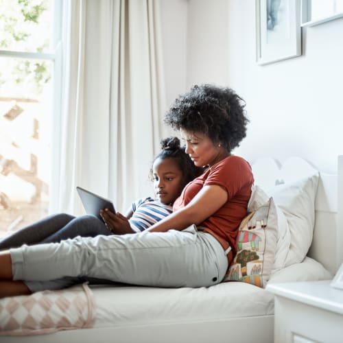 A mother watching with her daughter at Dashiell Mews in Indian Head, Maryland