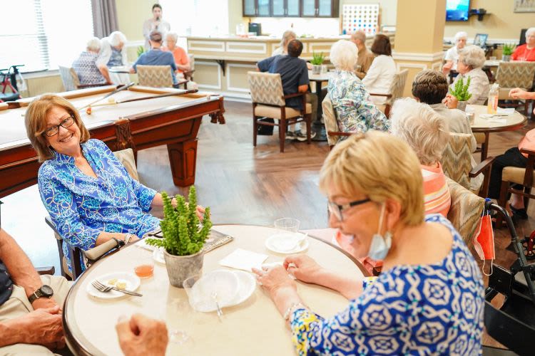 Residents at happy hour at The Harmony Collection at Hanover in Mechanicsville, Virginia