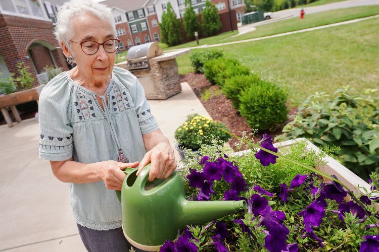 Resident gardening at Harmony at Avon in Avon, Indiana