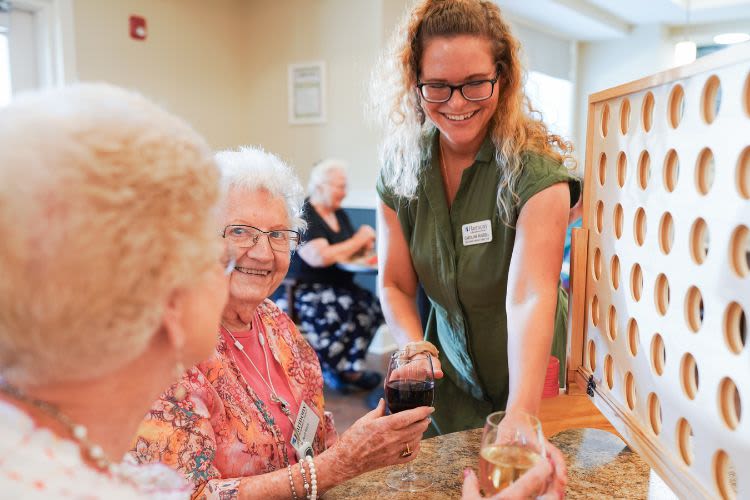 Residents and associate at happy hour at Harmony Senior Services in Charleston, South Carolina