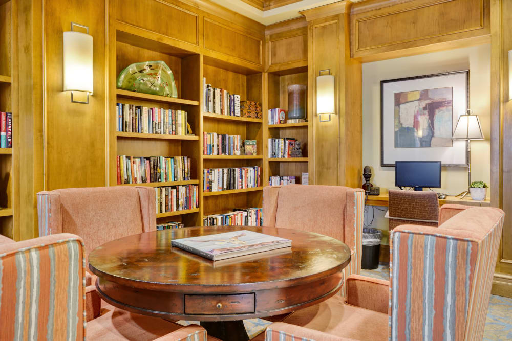 Cozy reading knock with sofa and large bookcase at The Bellettini in Bellevue, Washington