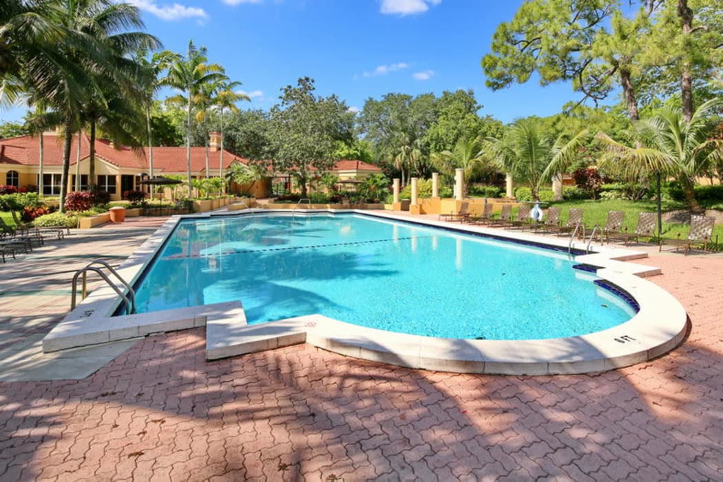 Beautiful swimming pool area at IMT Pinebrook Pointe in Margate, FL