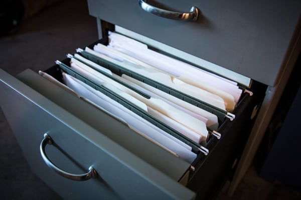 Open file cabinet with file folders and files