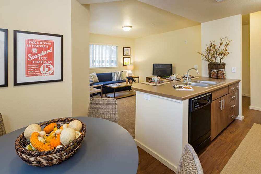 Dining table and kitchen at Copper Trail in Olympia, Washington