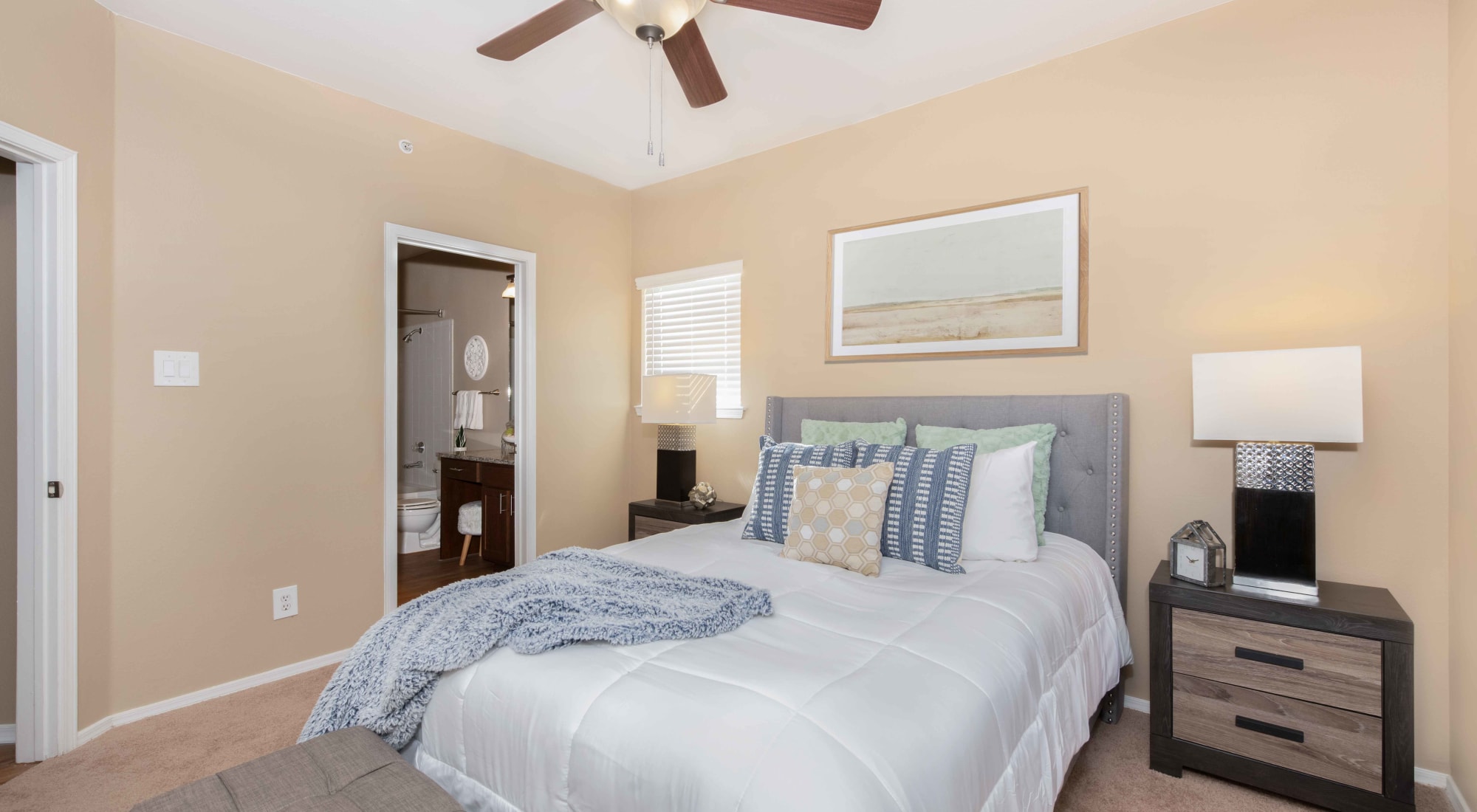 Bedroom with lighted ceiling fan at Lakeview at Parkside