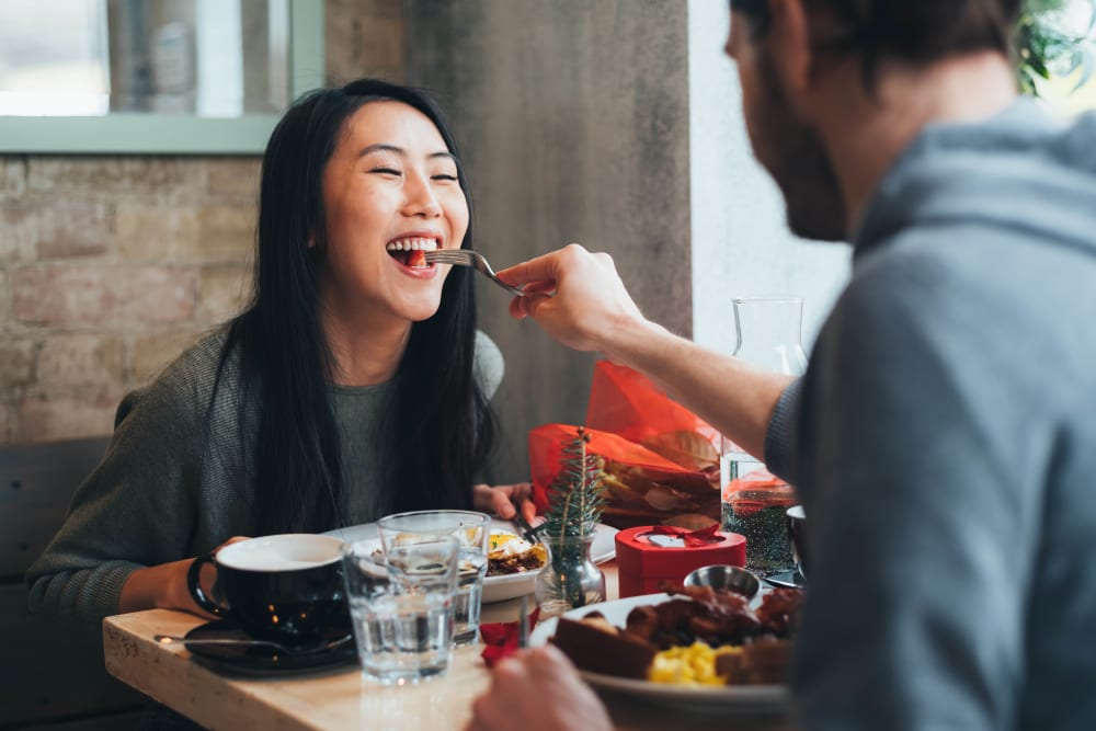 Couple having dinner near Suburban Terrace in Hackensack, New Jersey