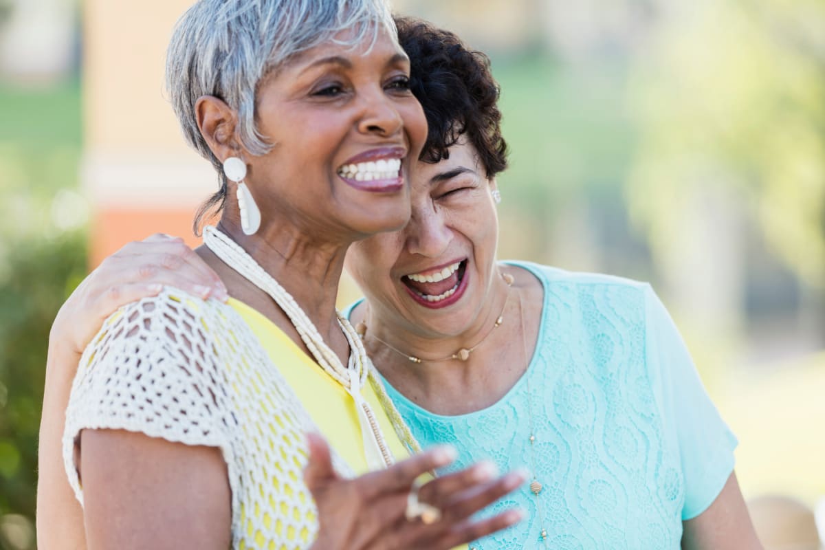 Two residents laughing and having a good time at Gentry Park Orlando in Orlando, Florida