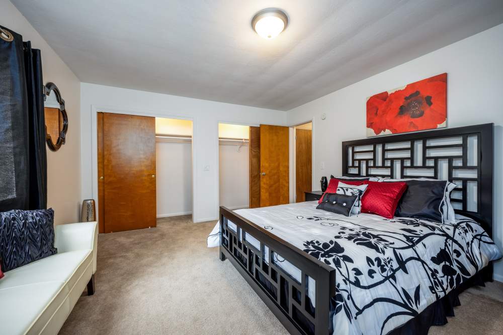 Spacious bedroom at Greece Commons Apartments in Rochester, New York