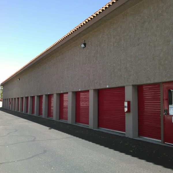 Drive-up access storage units with red doors at StorQuest Express Self Service Storage in Mesa, Arizona