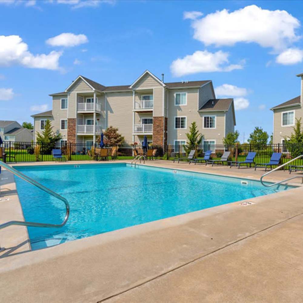 A resort style swimming pool at The Haven at Grand Landing Apartments in Grand Haven, Michigan