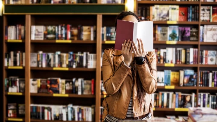 Resident reading a book at a local bookstore near The Davis in Fort Worth, Texas