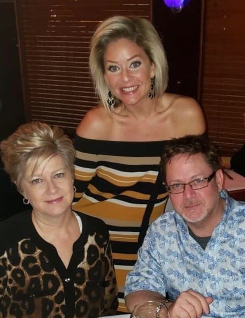 Staff members socializing near Alura By Inspired Living in Rockledge, Florida.
