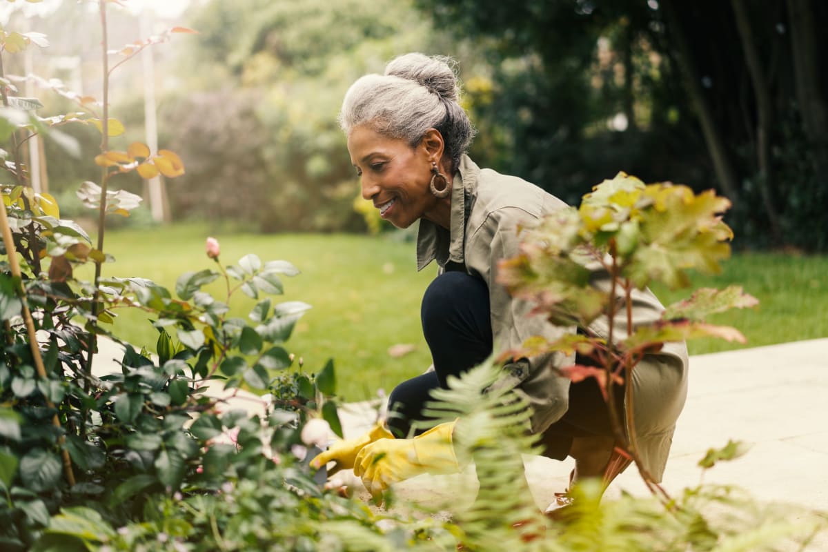 Resident gardening at The Meridian at Brandon in Tampa, Florida