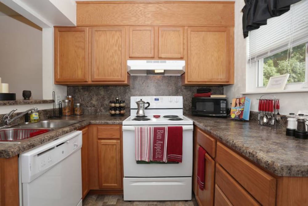 Kitchen with a double stainless-steel sink at Old Mill Townhomes in Lynchburg, Virginia