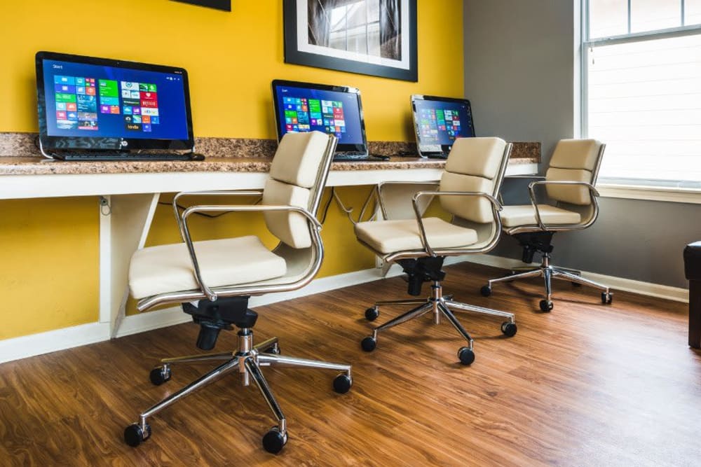 A business center with computers for resident use at Alvadora Apartments in Lawrence, Kansas