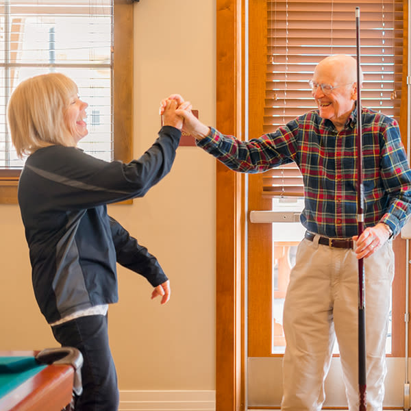 Team member and resident at Casey's Pond having fun