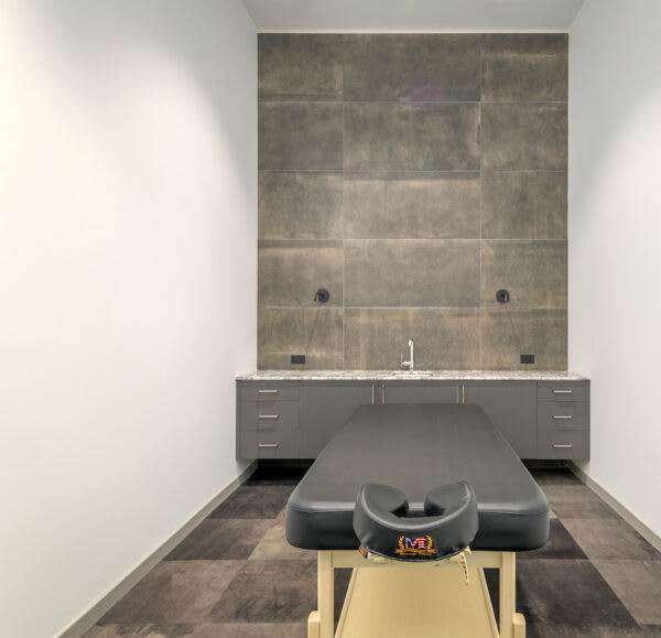 Clean massage room at {{location_name}} in {{location_city}}, {{location_state_name}}