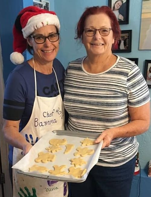 Staff members baking cookies at Inspired Living in Kenner, Louisiana.