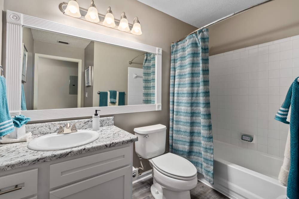A double sink in an apartment bathroom at Gates at Jubilee in Daphne, Alabama