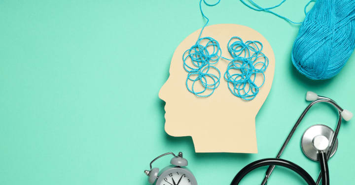 illustration of a brain with a blue yarn in it