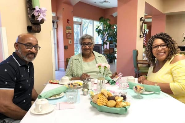 residents eating dinner at Wesley Haven Villa in Pensacola, Florida. 