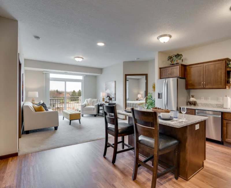 open floor plan of kitchen and living room independent living apartment