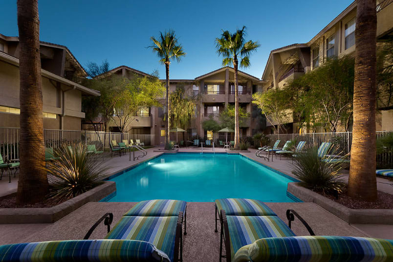 Ambient lighting at the swimming pool at dusk at McDowell Village in Scottsdale, Arizona