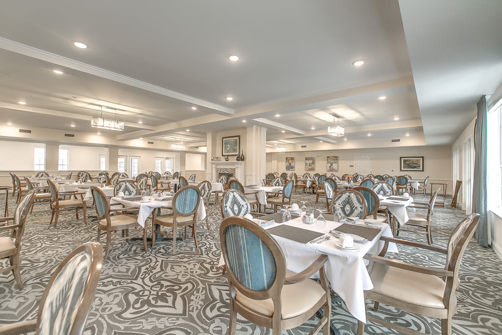 Well decorated dining room tables at Harmony at Victory Station in Murfreesboro, Tennessee