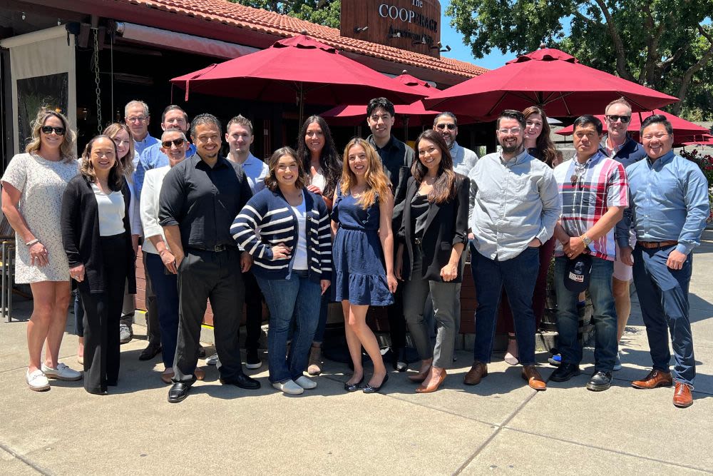 Sequoia employees celebrating their J Turner Reputation Elite status at a luncheon 